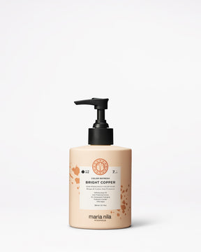 Maria Nila hair color product bottle on a white background