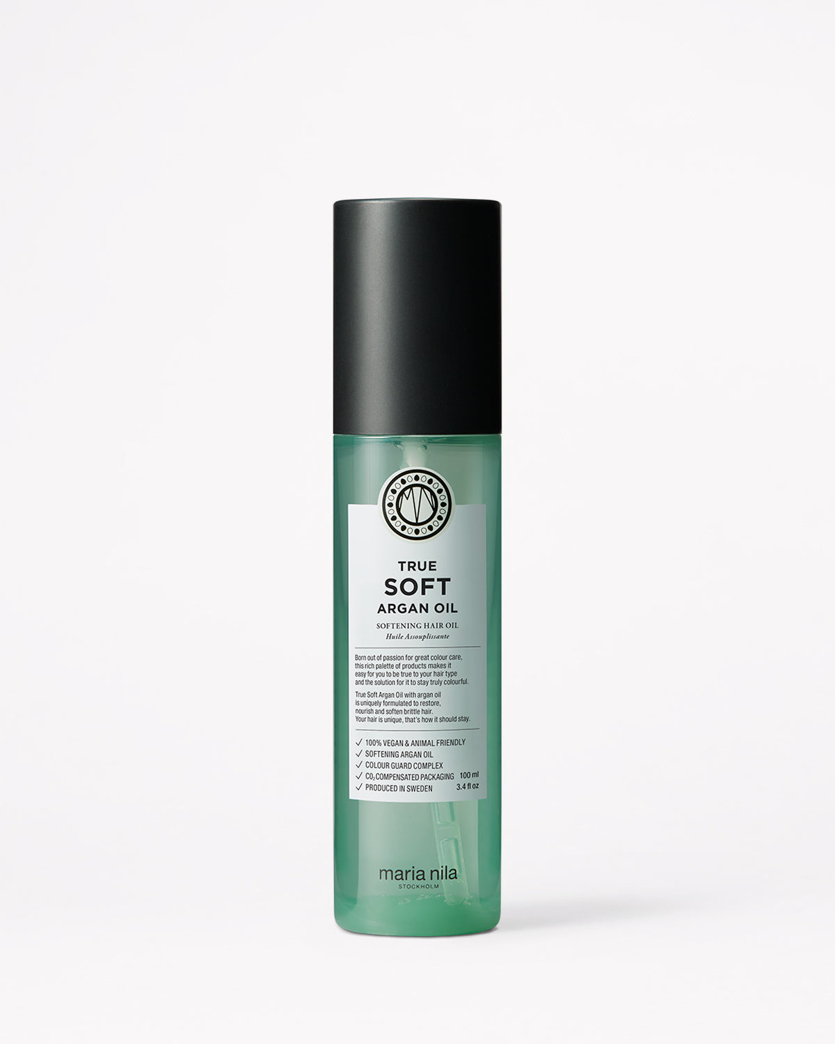 Bottle of Maria Nila True Soft Argan Oil on a white background