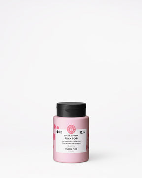 Pink hair color refresh product jar with black lid on a white background