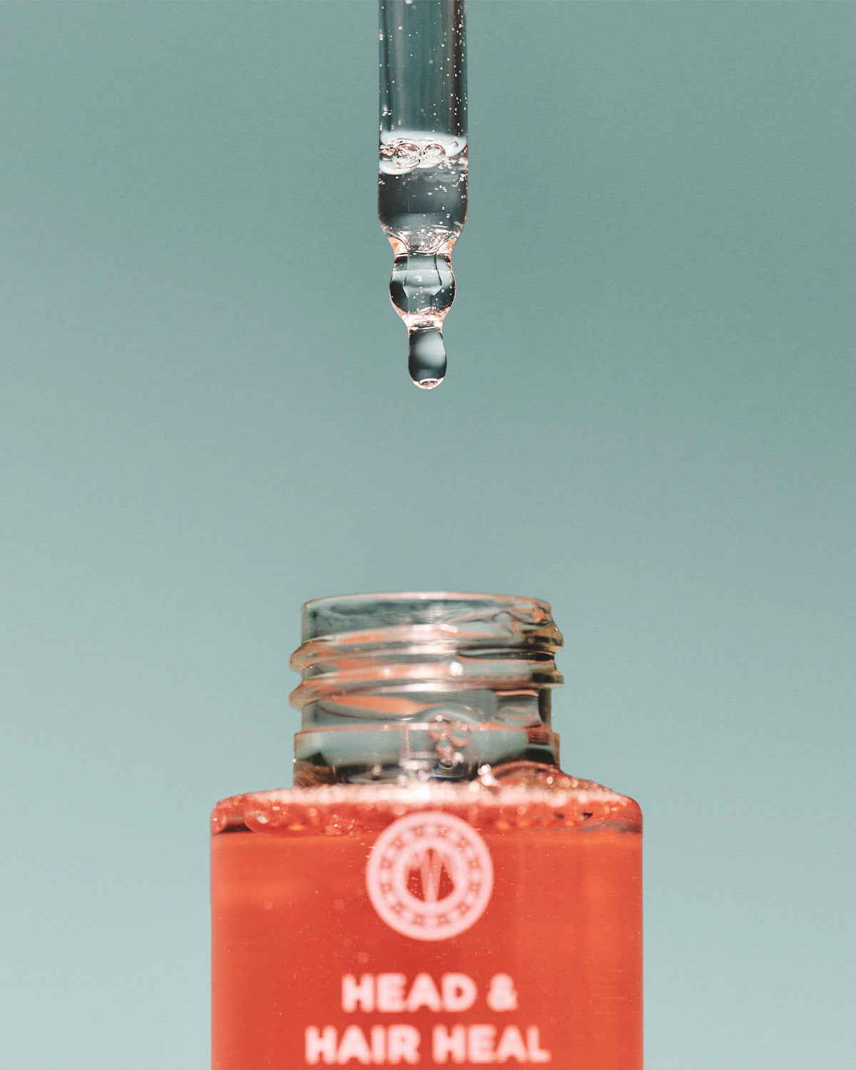 Maria Nila Head & Hair Heal Soothing Serum with serum formula and pipette bottle  