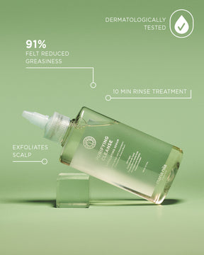 Purifying Cleanse Exfoliating Serum with serum formula and applicator bottle