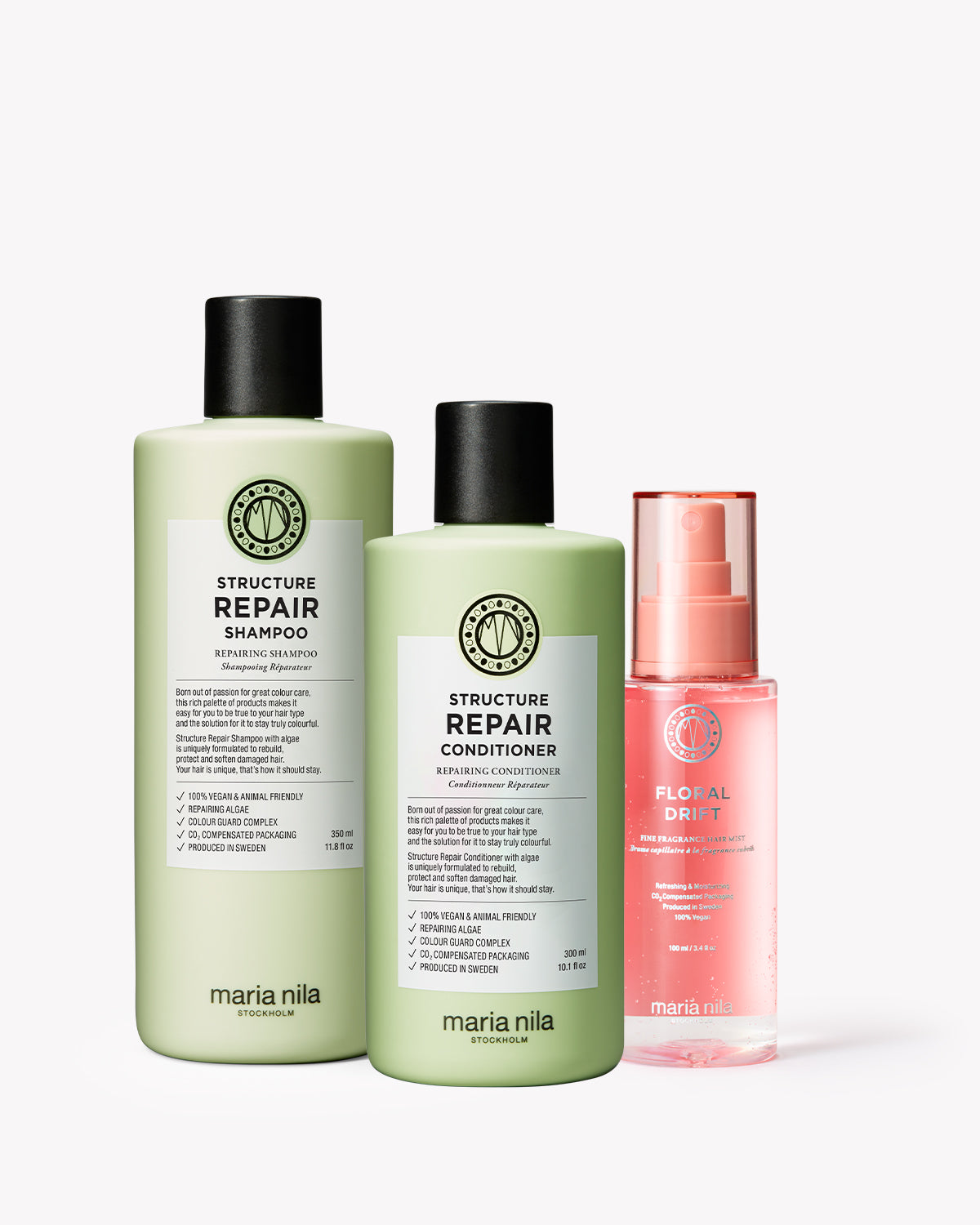 Three Maria Nila hair care products on a white background