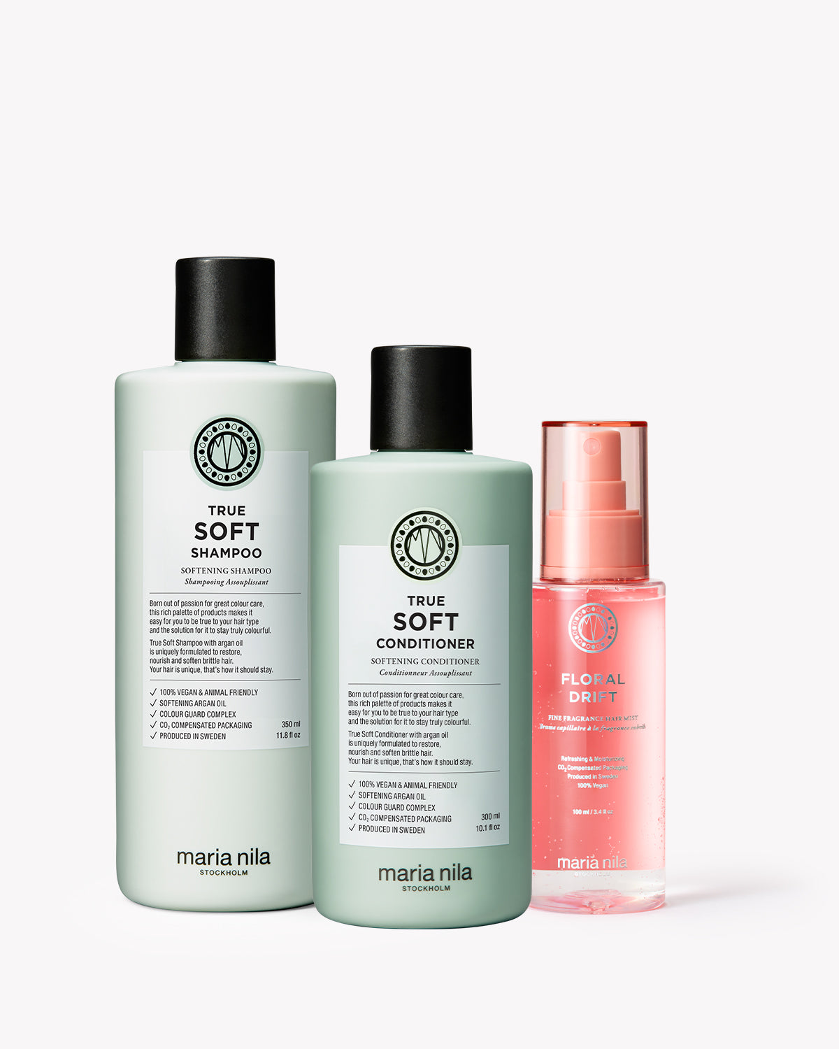 Three Maria Nila hair care products on a white background